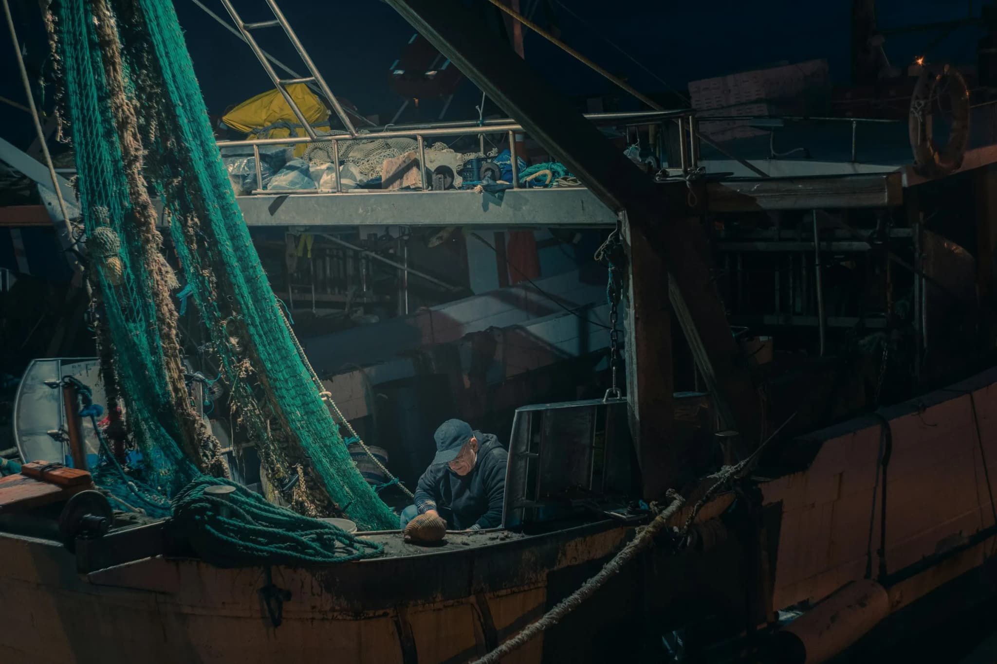 Nets piled on the deck of a fishing boat