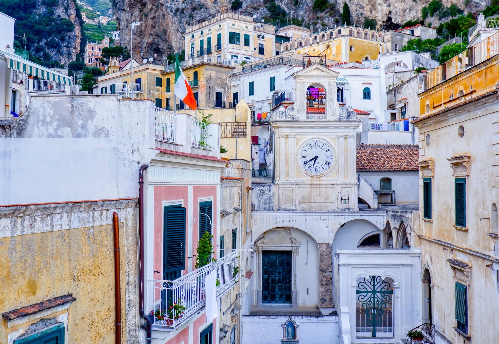Atrani’s square, enclosed by houses and the church steps