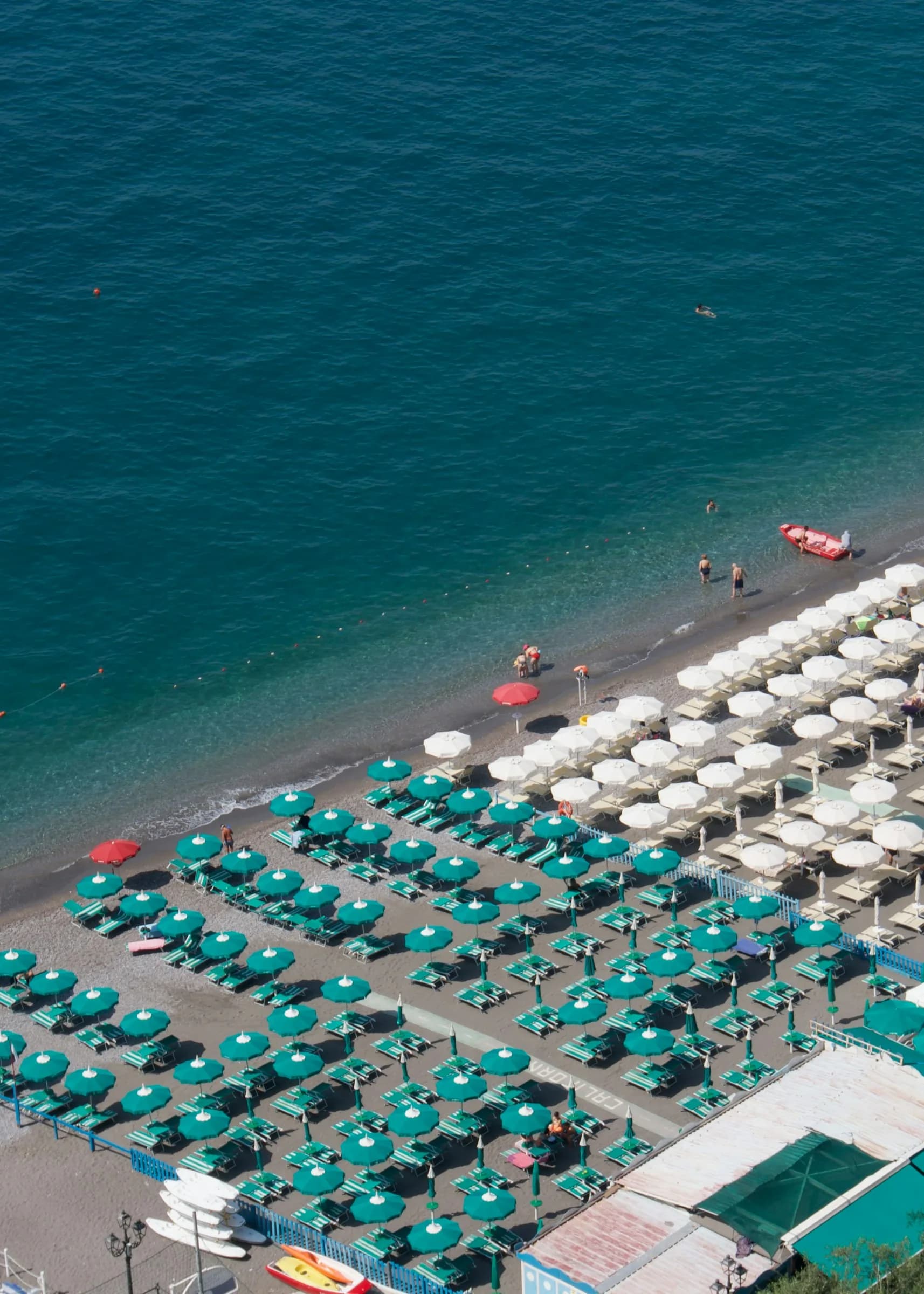 Umbrellas and loungers seen from above on the beach